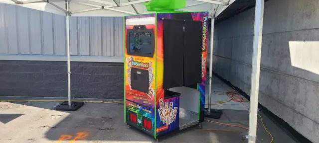 Photo booth set up in a covered outdoor area, June 2023