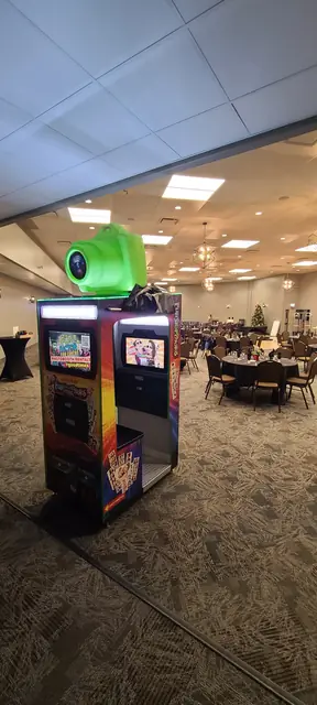 Photo booth at the side of a banquet hall, December 2024